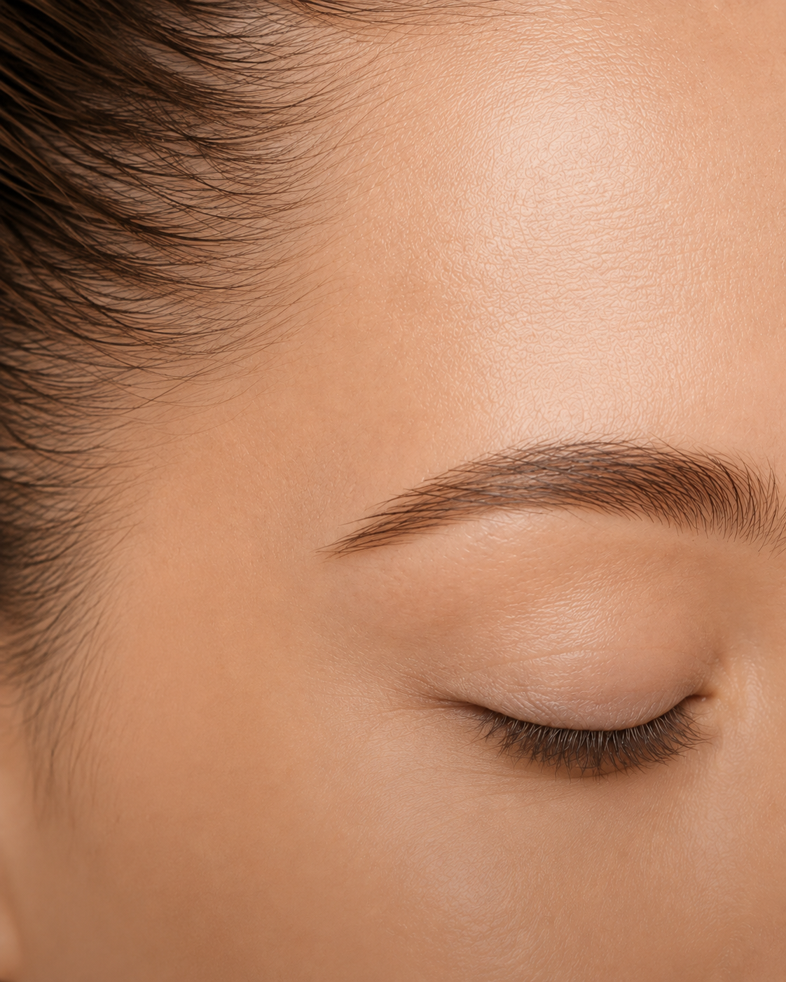 Close-up of smooth-looking forehead and temple